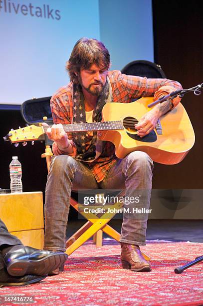 Singer Billy Ray Cyrus performs before his book signing of his new book "Hillbilly Heart" at the New Roads School Moss Theater on April 24, 2013 in...