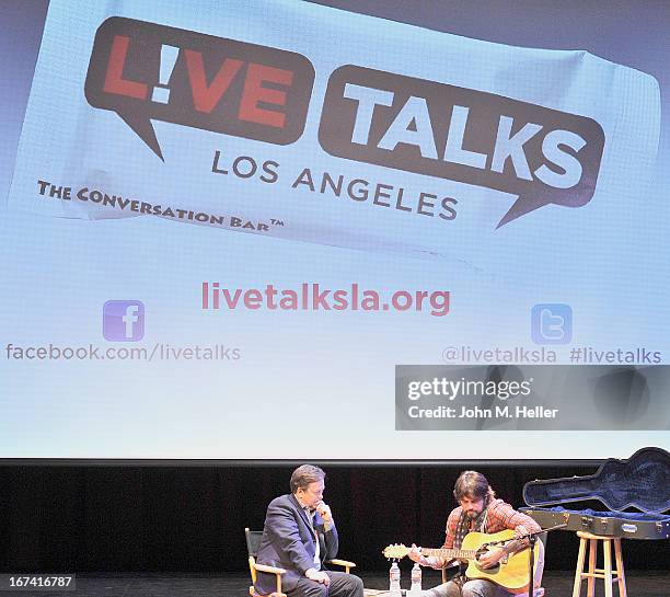 Interviewer and KTLA Reporter Sam Rubin interviews Singer Billy Ray Cyrus before his book signing of his new book "Hillbilly Heart" at the New Roads...