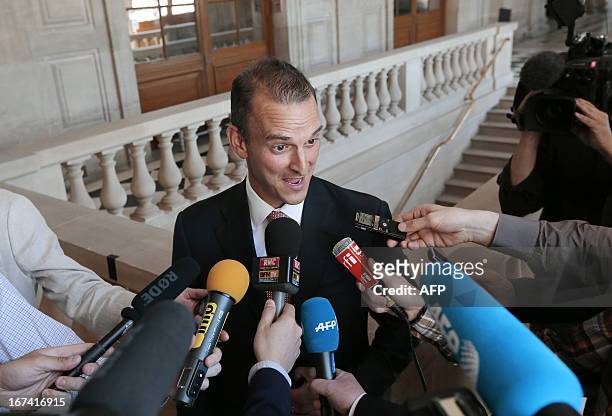 Travis Tygart, chief executive officer of the US Anti-Doping Agency , answers journalists' questions on April 25, 2013 at the French Senate in Paris,...