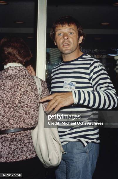 Anthony Hopkins and his wife Jennifer Lynton at the Pavilion Restaurant in the United States, circa 1970s.