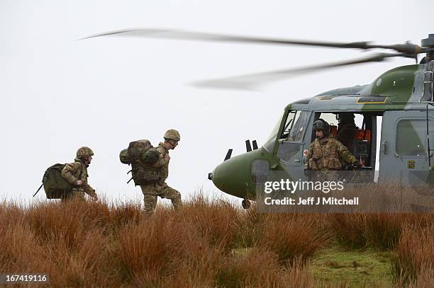 Helicopter lands during a British And French Airborne Forces joint exercise on April 25, 2013 in Stranraer, Scotland. Exercise 'Joint Warrior' sees...