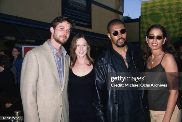 Noah Wyle, Eriq La Salle and their dates during "Out of Sight" Los Angeles Premiere at the Cineplex Odeon Universal Studios Cinema in Universal City,...