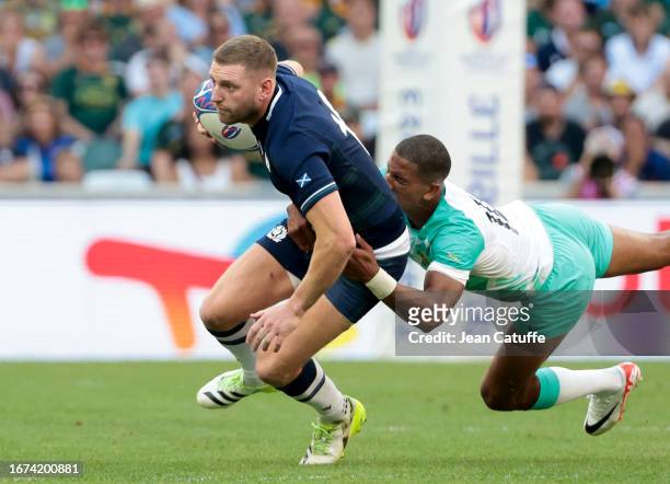 Finn Russell of Scotland, Manie Libbok of South Africa during the Rugby World Cup France 2023 match between South Africa and Scotland at Stade...