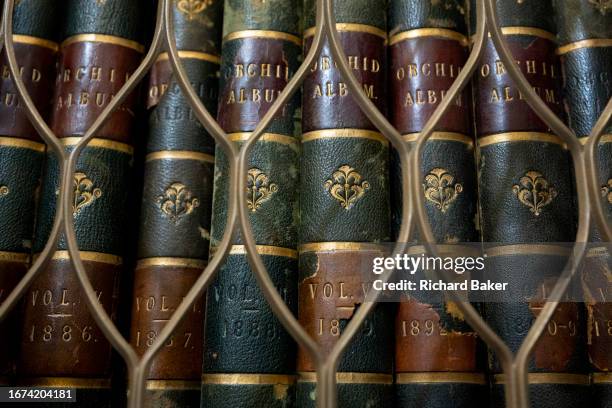 Behind security grills are scientific publications on natural history in the library of the Linnean Society, on 16th September 2023, in London,...