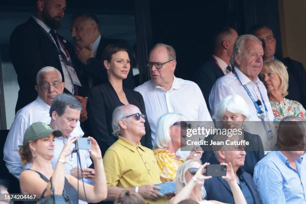 Princess Charlene of Monaco and Prince Albert II of Monaco, between Mark Alexander, president of the South African Rugby Union and Sir Bill Beaumont,...