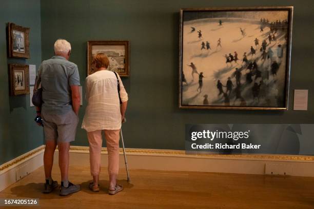 Art lovers admire paintings in the Royal Academy, on 16th September 2023, in London, England.