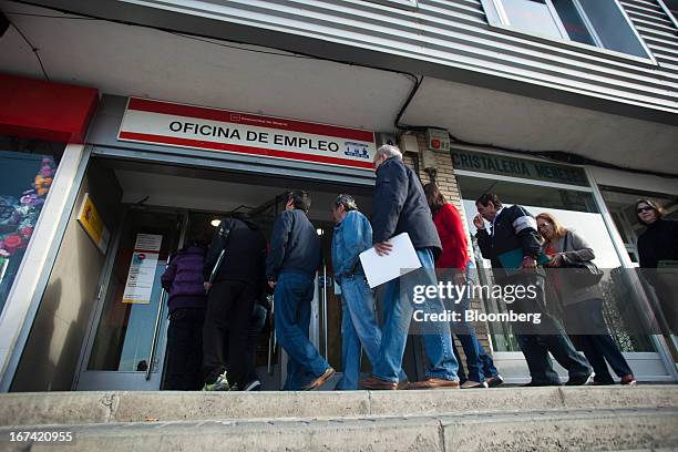 Jobseekers enter an employment office after opening in Madrid, Spain, on Thursday, April 25, 2013. Spanish unemployment rose more than economists...