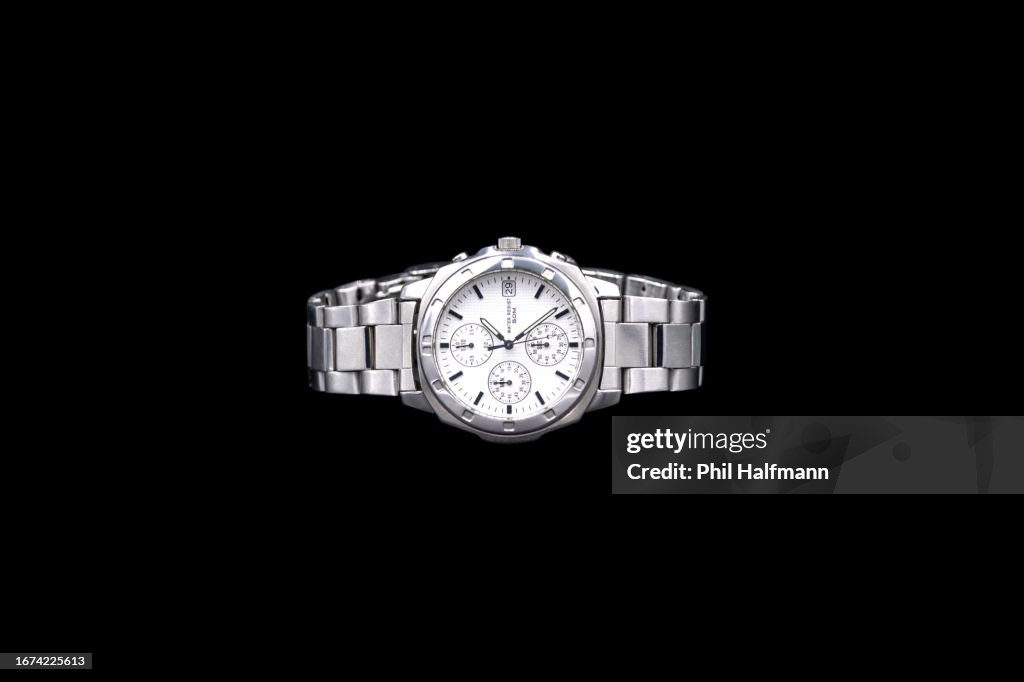 Precious Silver Metal Men’s Chronograph Wrist Watch On Black Background