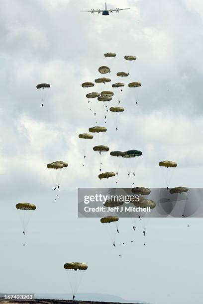 2nd Battalion, Parachute Regiment parachute from an aeroplane during a British And French Airborne Forces joint exercise on April 25, 2013 in...