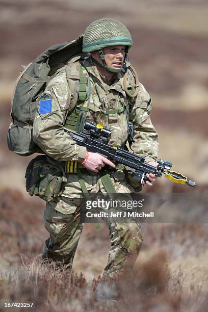 Soldier participates in a British And French Airborne Forces joint exercise on April 25, 2013 in Stranraer, Scotland. Exercise 'Joint Warrior' sees...