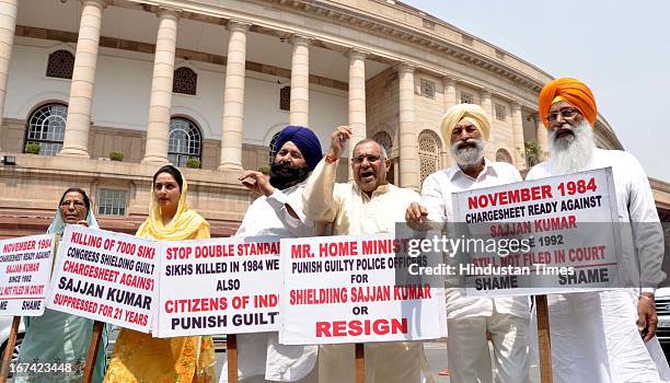 Shiromani Akali Dal members of parliament protest against 1984 Sikh riot demanding action against guilty police officers who sheilded accused in the...