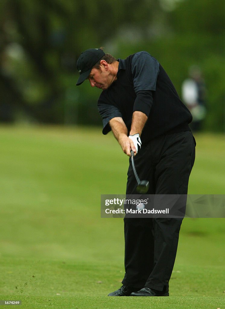 Nick Faldo plays his second shot