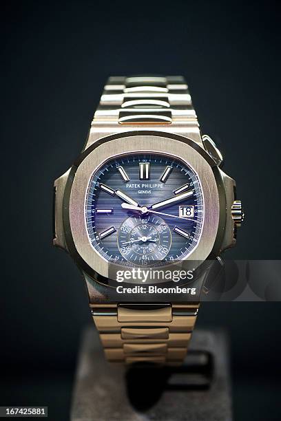 Wristwatch, manufactured by Patek Philippe SA, sits on display during the Baselworld watch fair in Basel, Switzerland, on Wednesday, April 24, 2013....