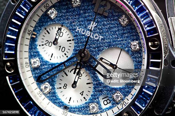 The dial of a wristwatch in the "Jeans" collection by Hublot SA, a watchmaking unit of LVMH Moet Hennessy Louis Vuitton SA, is seen during the...