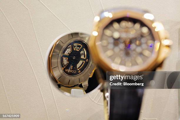 An Admiral's Cup AC One wristwatch, manufactured by Montres Corum, sits on display at the Baselworld watch fair in Basel, Switzerland, on Thursday,...