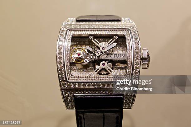Ti-Bridge Tourbillon wristwatch, manufactured by Montres Corum, sits on display at the Baselworld watch fair in Basel, Switzerland, on Thursday,...