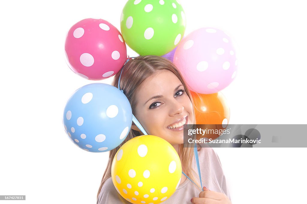 Beautiful girl with balloons