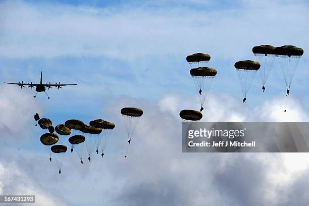 2nd Battalion, Parachute Regiment parachute from an aeroplane during a British And French Airborne Forces joint exercise on April 25, 2013 in...