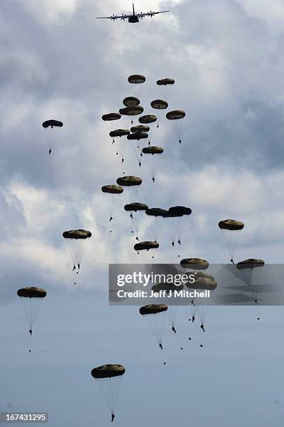 2nd Battalion, Parachute Regiment parachute from an aeroplane during a British And French Airborne Forces joint exercise on April 25, 2013 in...