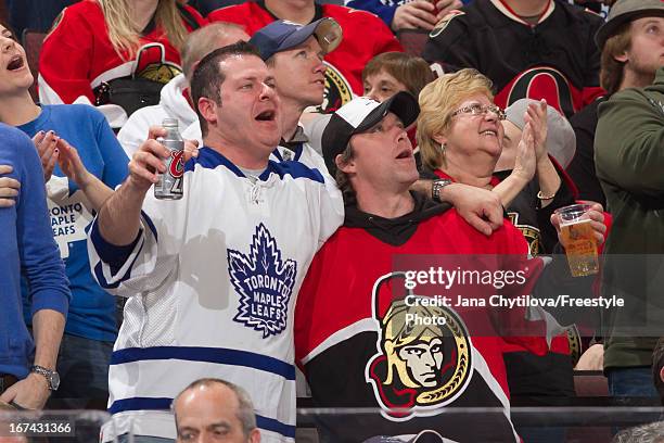 Toronto fan and an Ottawa fan sing along with Sweet Caroline as a show of appreciation for residents of Boston following the tragedy at the marathon,...