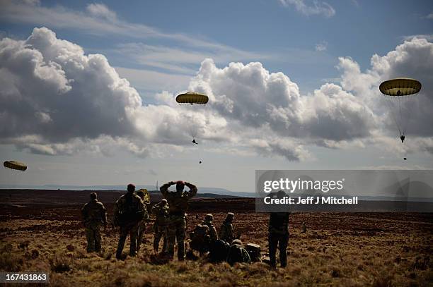 2nd Battalion, Parachute Regiment parachute from an aeroplane during a British And French Airborne Forces joint exercise on April 25, 2013 in...