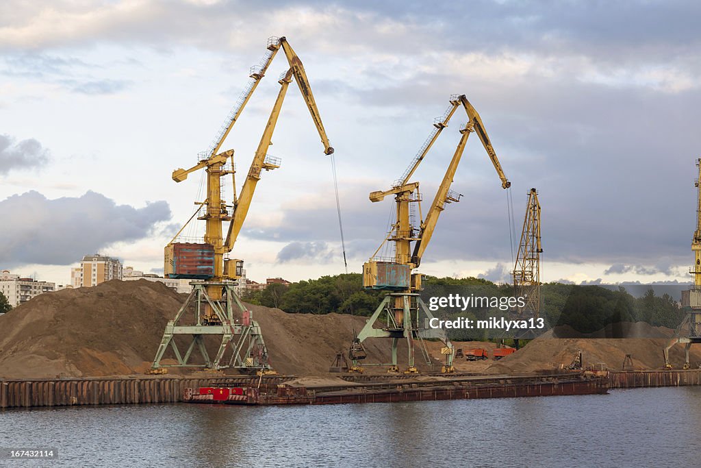 River port and cranes, barge