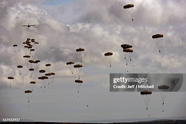 2nd Battalion, Parachute Regiment parachute from an aeroplane during a British And French Airborne Forces joint exercise on April 25, 2013 in...