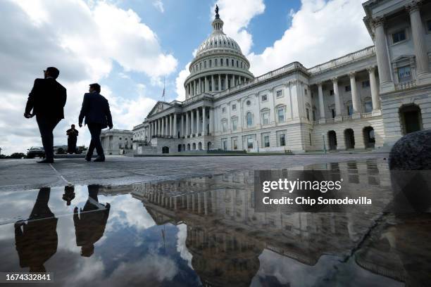 Visitors walk past the U.S. Capitol on September 11, 2023 in Washington, DC. The House of Representatives is scheduled to return Tuesday following an...