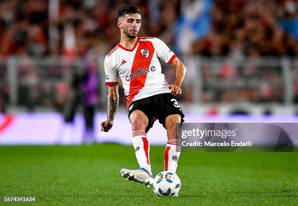 Santiago Simon of River Plate kicks the ball during a match between River Plate and Arsenal as part of group A of Copa de la Liga Profesional 2023 at...