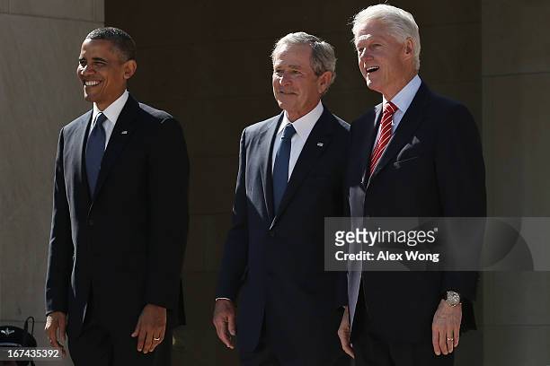 President Barack Obama, former President George W. Bush and former President Bill Clinton attend the opening ceremony of the George W. Bush...