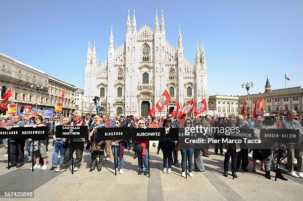 People attend a march to celebrate the 68th Festa Della Liberazione in Duomo Square on April 25, 2013 in Milan, Italy.The symbolic celebration day...