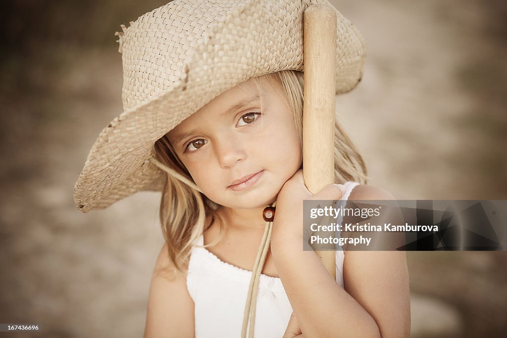 Girl with a cowboy hat