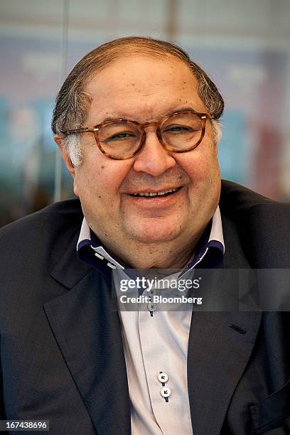 Russian billionaire Alisher Usmanov smiles during a Bloomberg interview in Moscow, Russia, on Thursday, April 25, 2013. Usmanov, Russia's wealthiest...