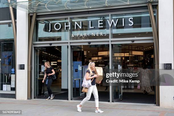 John Lewis along the High Street on 15th September 2023 in Cheltenham, United Kingdom. The high street is the centre of many English towns and...