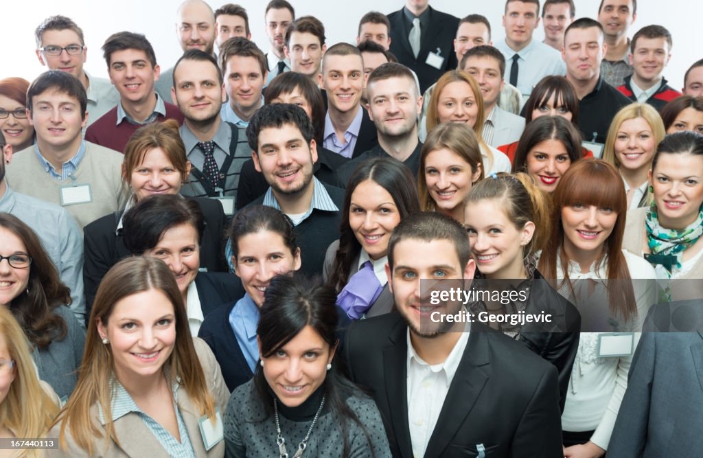 Large group of people smiling in camera