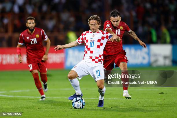 Lucas Zelarayan of Armenia battles for possession with Luka Modric of Croatia during the UEFA EURO 2024 European qualifier match between Armenia and...