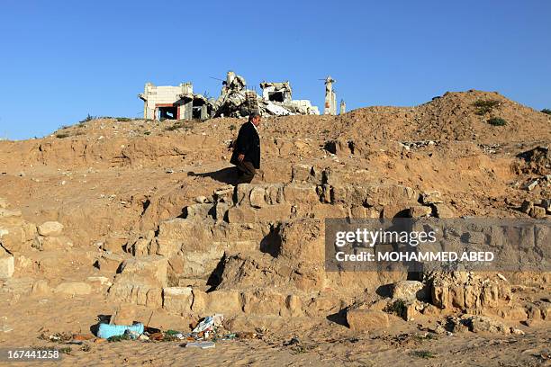 Palestinian worker inspects the ancient archaeological site of Anthedon Harbour, also know as "al-Blakhiyah", which is located next to a training...
