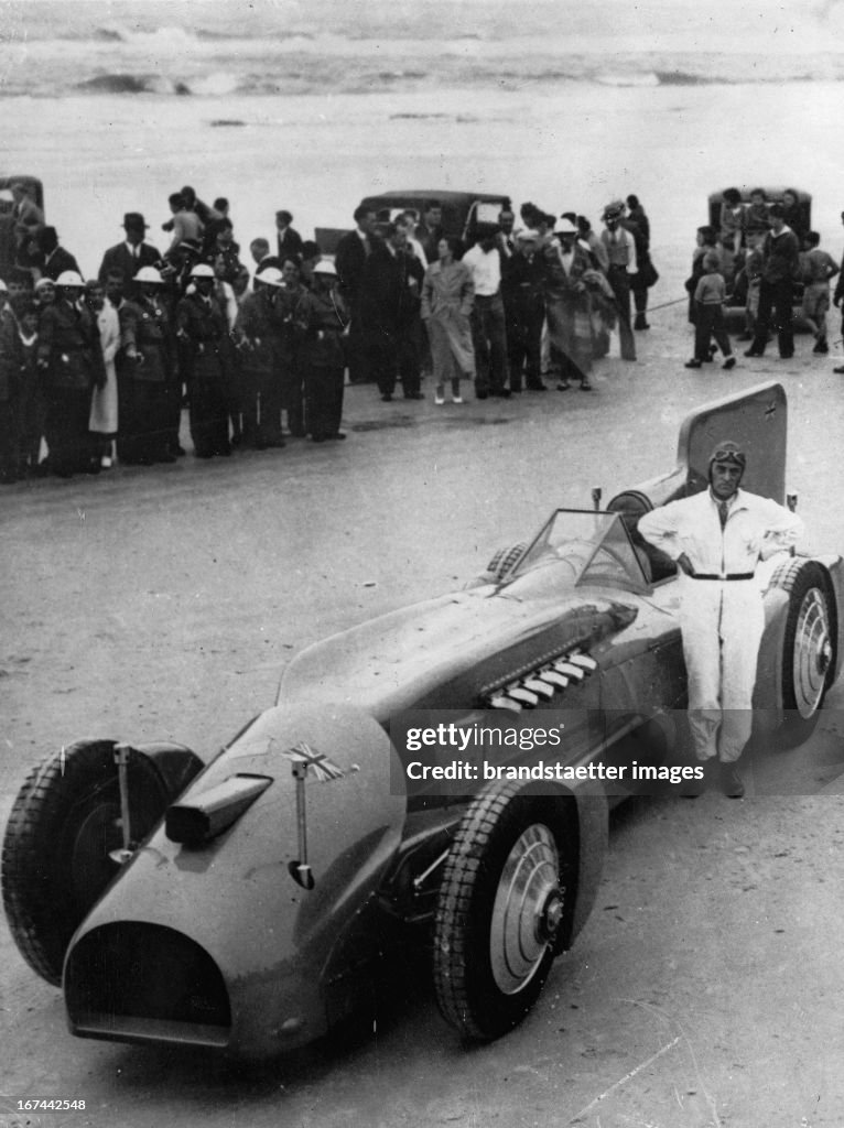 The British racer Malcolm Campbell with his race car Bluebird.... News ...