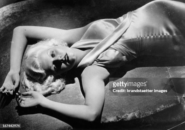 The US-american actress Jean Harlow. 1933. Photograph. Die US-amerikanische Schauspielerin Jean Harlow. 1933. Photographie.