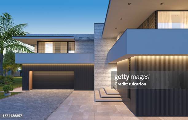 modern luxurious villa with palms garden. - stone house stock pictures, royalty-free photos & images