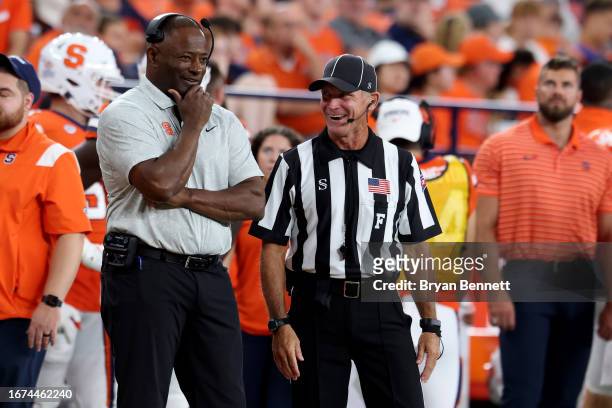 Head coach Dino Babers of the Syracuse Orange speaks with an official during the third quarter against the Western Michigan Broncos at JMA Wireless...