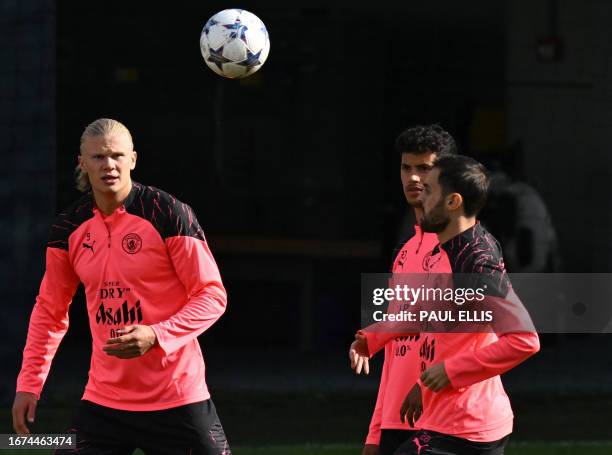 Manchester City's Norwegian striker Erling Haaland , Manchester City's Portuguese midfielder Matheus Nunes and Manchester City's Portuguese...