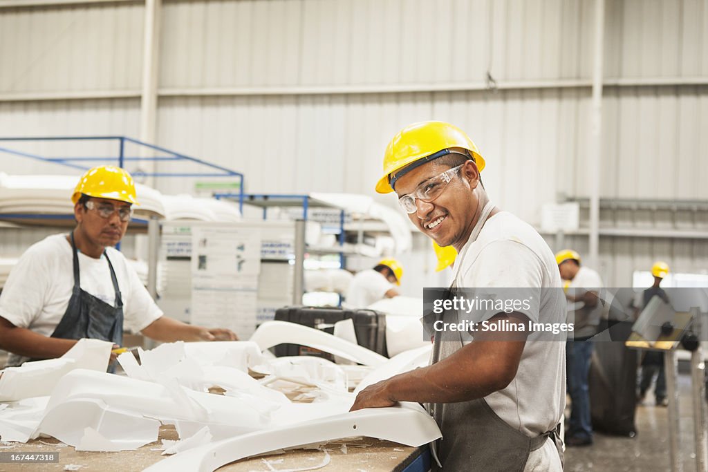 Men working in manufacturing plant