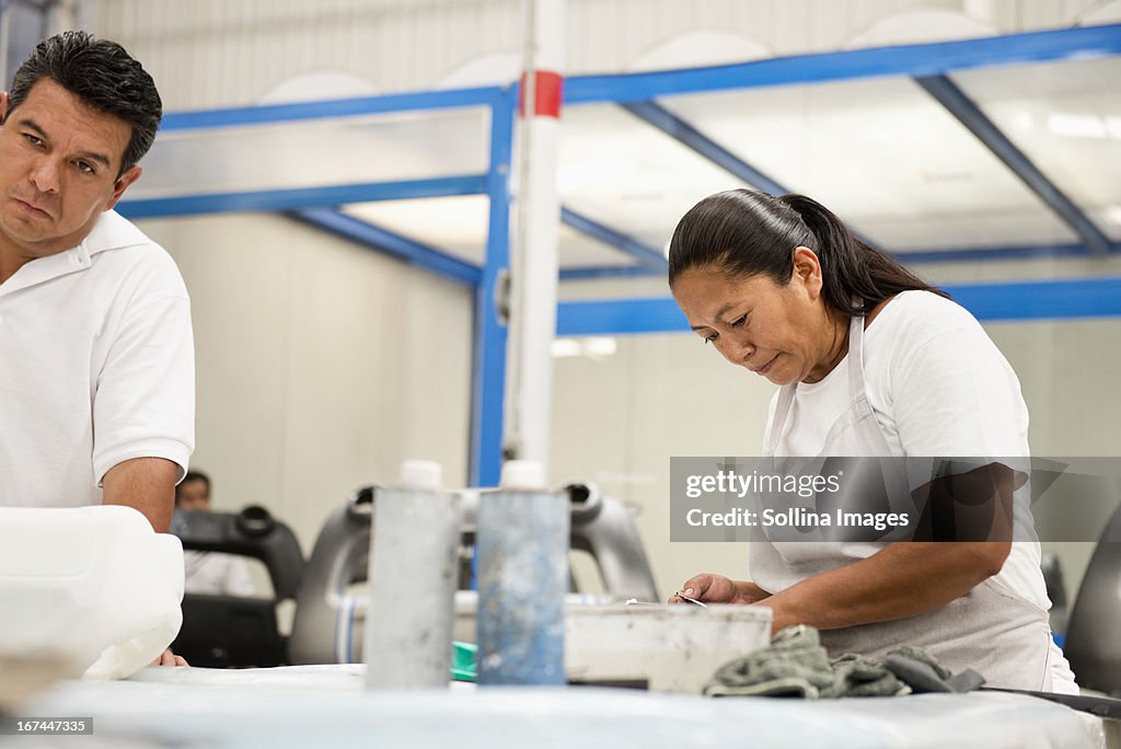 People working in manufacturing plant