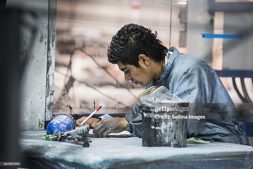 Man working in manufacturing plant