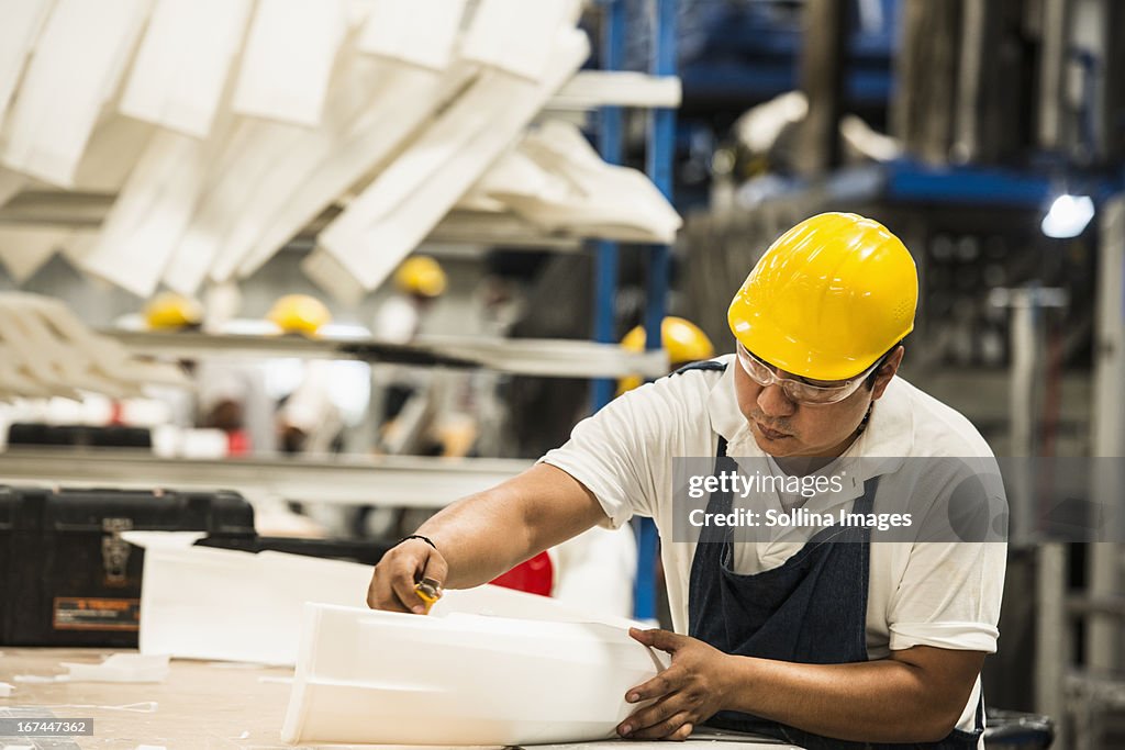 Man working in manufacturing plant