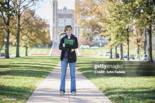 caucasian student standing on campus - university of missouri fotografías e imágenes de stock