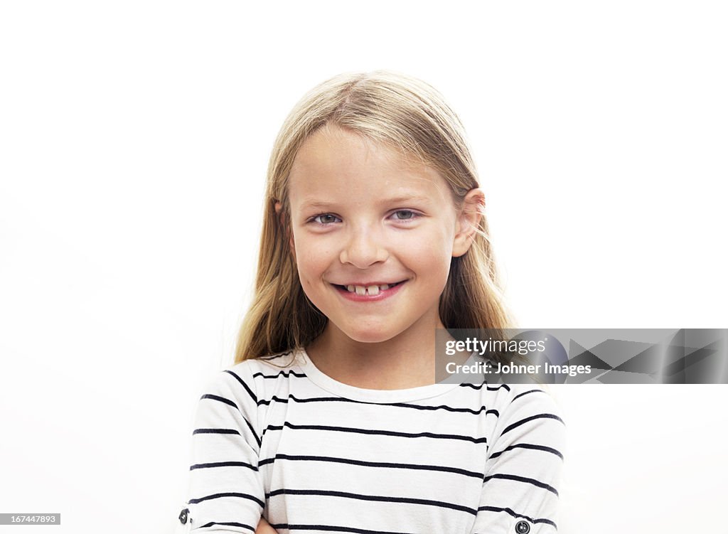 Portrait of smiling girl, studio shot