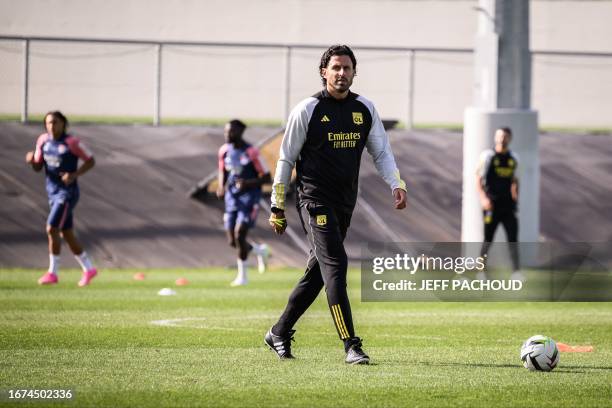 Lyon's Italian new head coach Fabio Grosso leads his first training session with the Olympique Lyonnais' players in Decines-Charpieu, eastern France,...