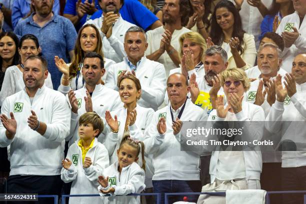 September 10: The team of Novak Djokovic of Serbia, including wife Jelena Djokovic and children Stefan and Tara, wearing tracksuit tops representing...